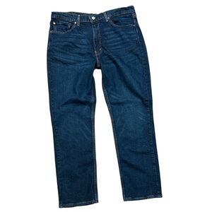 Levi’s 514 dark blue jeans. Size 38x30, but I measure waist at 36”